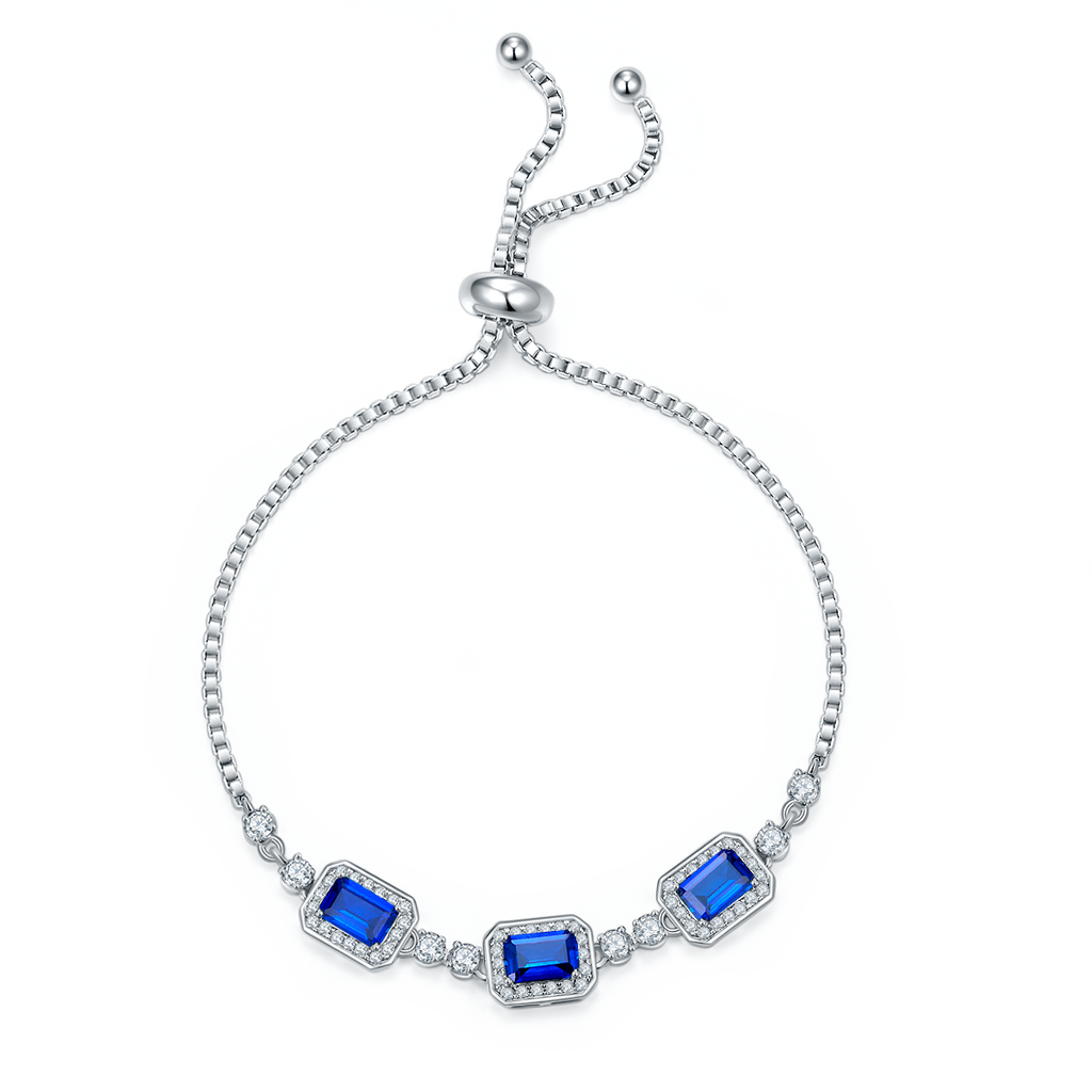Emerald-Cut Blue Sapphire Three-Stone Halo Bolo Bracelet in 925 Sterling Silver