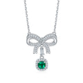 Lab-Created Emerald Cushion-Cut Bow Halo Pendant Necklace in 925 Sterling Silver